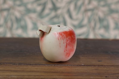Lot 430 - A carved and stained ivory okimono