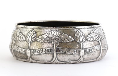 Lot 37 - An Arts and Crafts silver christening bowl