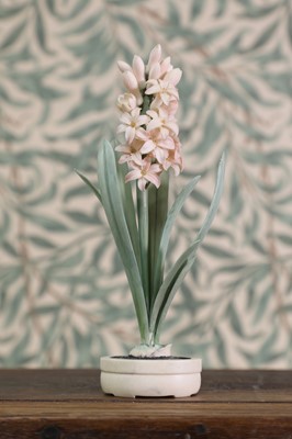 Lot 431 - A carved and stained ivory okimono