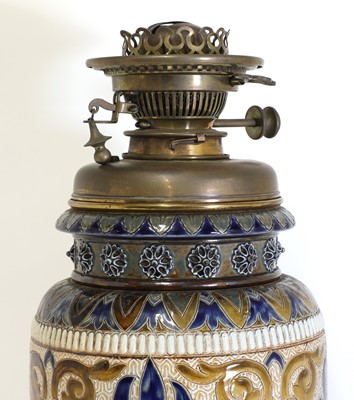 Lot 95 - A Doulton Lambeth stoneware oil lamp