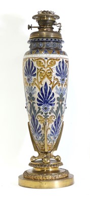 Lot 95 - A Doulton Lambeth stoneware oil lamp