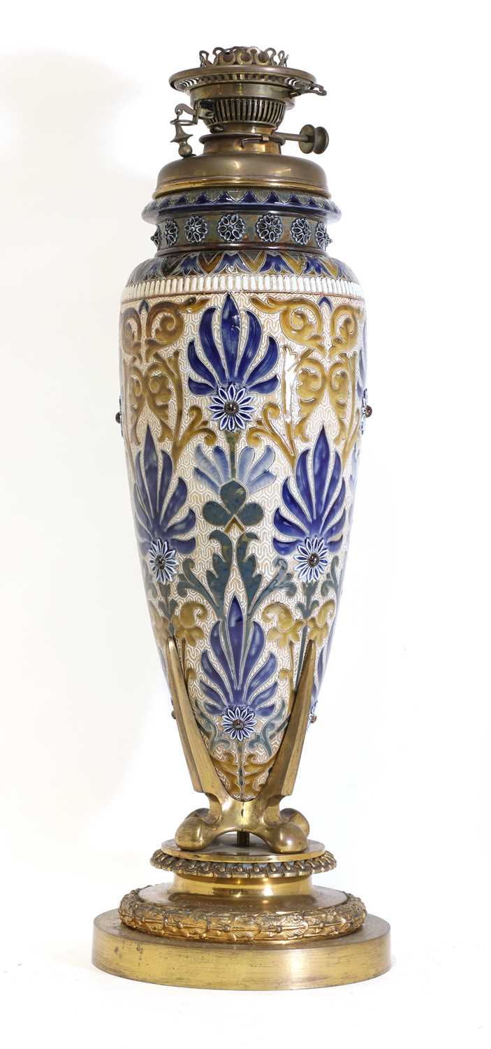 Lot 95 - A Doulton Lambeth stoneware oil lamp