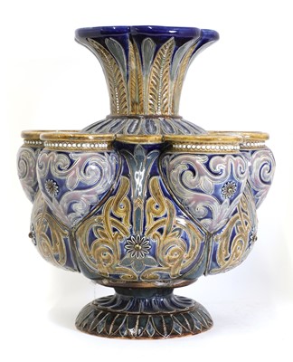Lot 88 - A Doulton Lambeth stoneware crocus vase