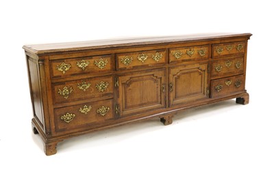 Lot 374A - A George III Lancashire oak and crossbanded dresser