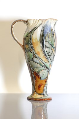 Lot 25 - A Royal Doulton stoneware ewer