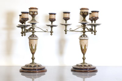 Lot 32 - A pair of Doulton Lambeth stoneware candelabra