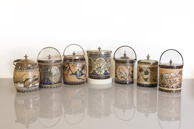 Lot 59 - Seven Doulton Lambeth stoneware biscuit barrels