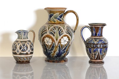 Lot 38 - Three Doulton Lambeth stoneware jugs