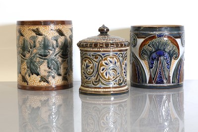 Lot 41 - A Doulton Lambeth stoneware tobacco jar and two pots