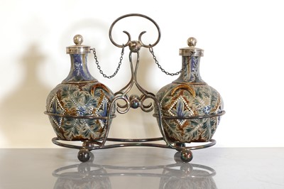 Lot 45 - A Doulton Lambeth stoneware double cruet set