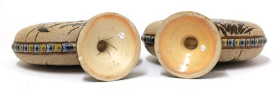 Lot 42 - A pair of Doulton Lambeth stoneware moon flasks
