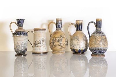 Lot 33 - A collection of five Doulton Lambeth stoneware ewers
