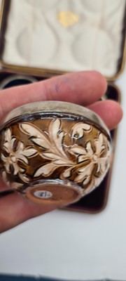 Lot 47 - A cased set of four Doulton Lambeth stoneware cruets