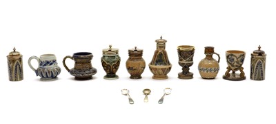 Lot 47 - A cased set of four Doulton Lambeth stoneware cruets