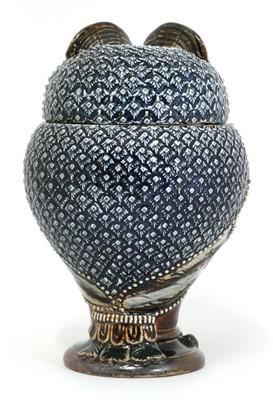 Lot 91 - A Doulton Lambeth stoneware 'owl' jar and cover
