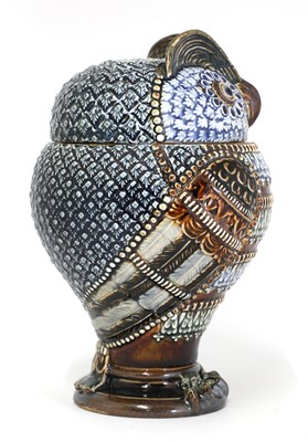 Lot 91 - A Doulton Lambeth stoneware 'owl' jar and cover