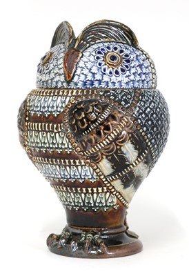 Lot 91 - A Doulton Lambeth stoneware 'owl' jar and cover
