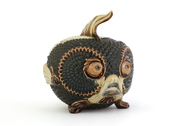 Lot 55 - A Doulton Lambeth figural stoneware jar and cover