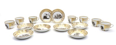 Lot 66 - A monochrome and gilt set of cups and saucers