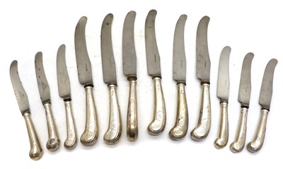 Lot 42 - A set of six silver handled table knives