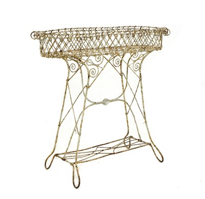 Lot 392 - A Victorian white painted wire plant stand
