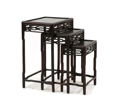 Lot 390 - A nest of three Chinese tables