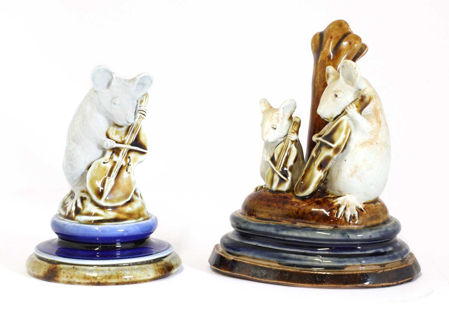 Lot 69 - A Doulton stoneware 'Mouse Musician' menu holder