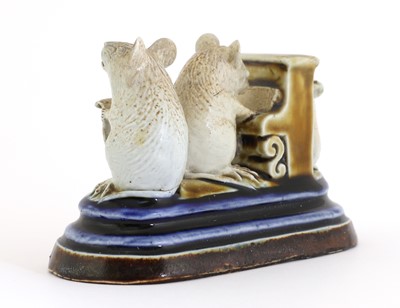 Lot 65 - A Doulton stoneware 'Mouse Musicians' group