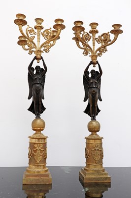Lot 761 - A pair of Empire-style gilt and patinated bronze candelabra