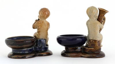 Lot 57 - Two Doulton stoneware figural salts