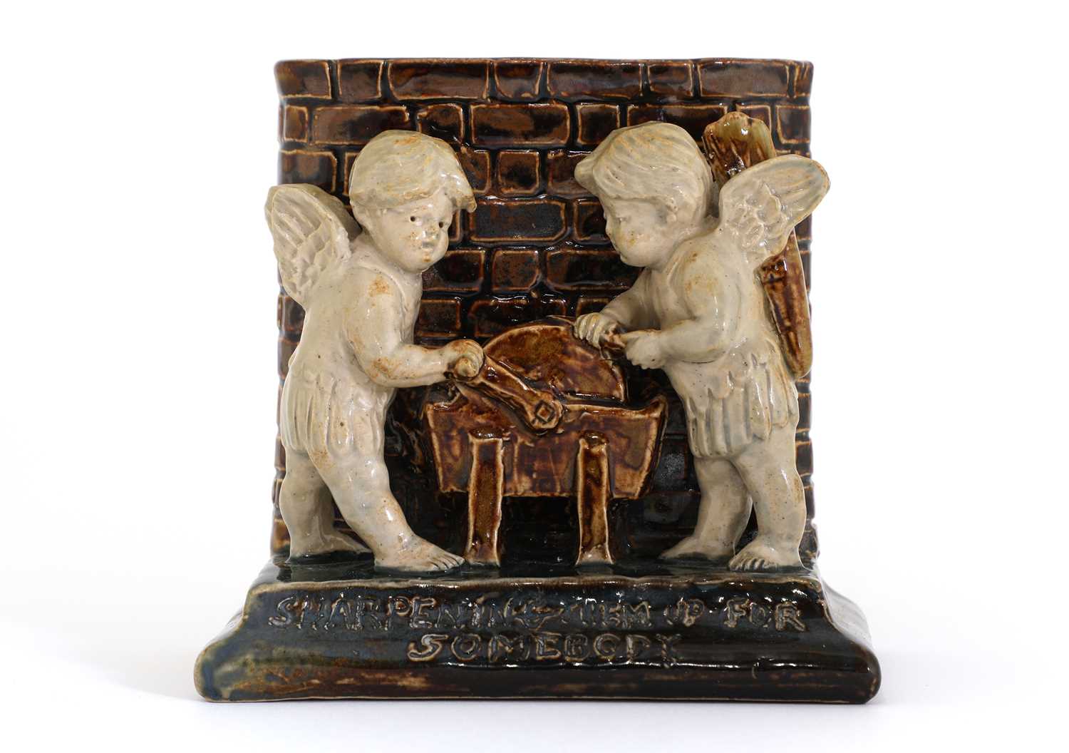 Lot 61 - A Doulton Lambeth stoneware spill vase, 'Sharpening Them Up For Somebody'