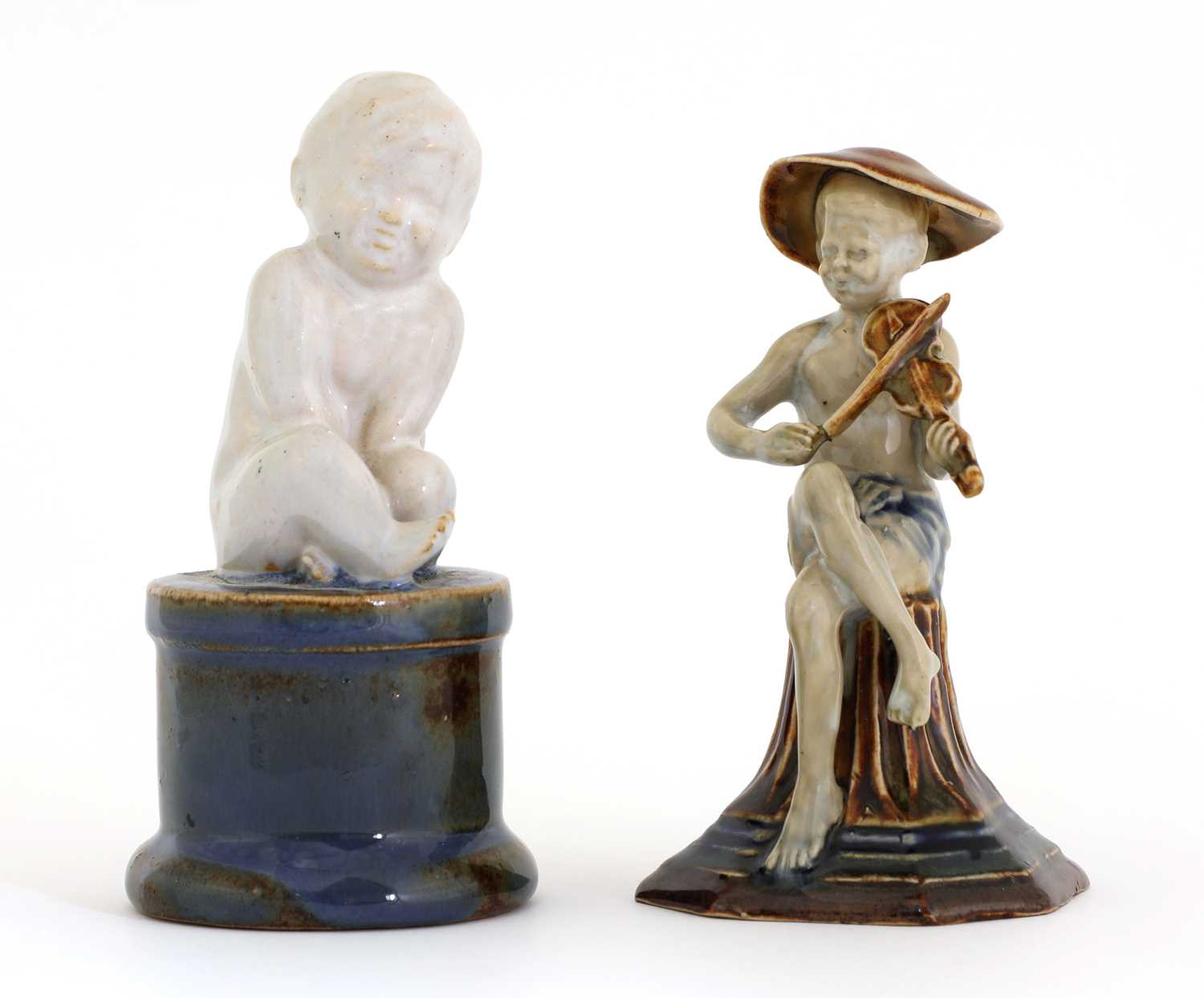 Lot 71 - A Doulton stoneware 'Merry Musician' menu holder