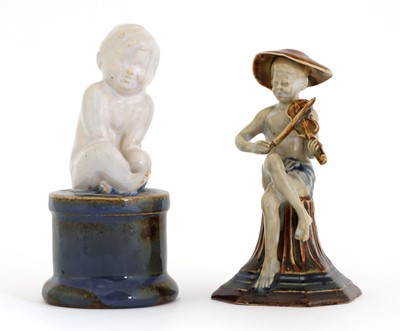 Lot 71 - A Doulton stoneware 'Merry Musician' menu holder