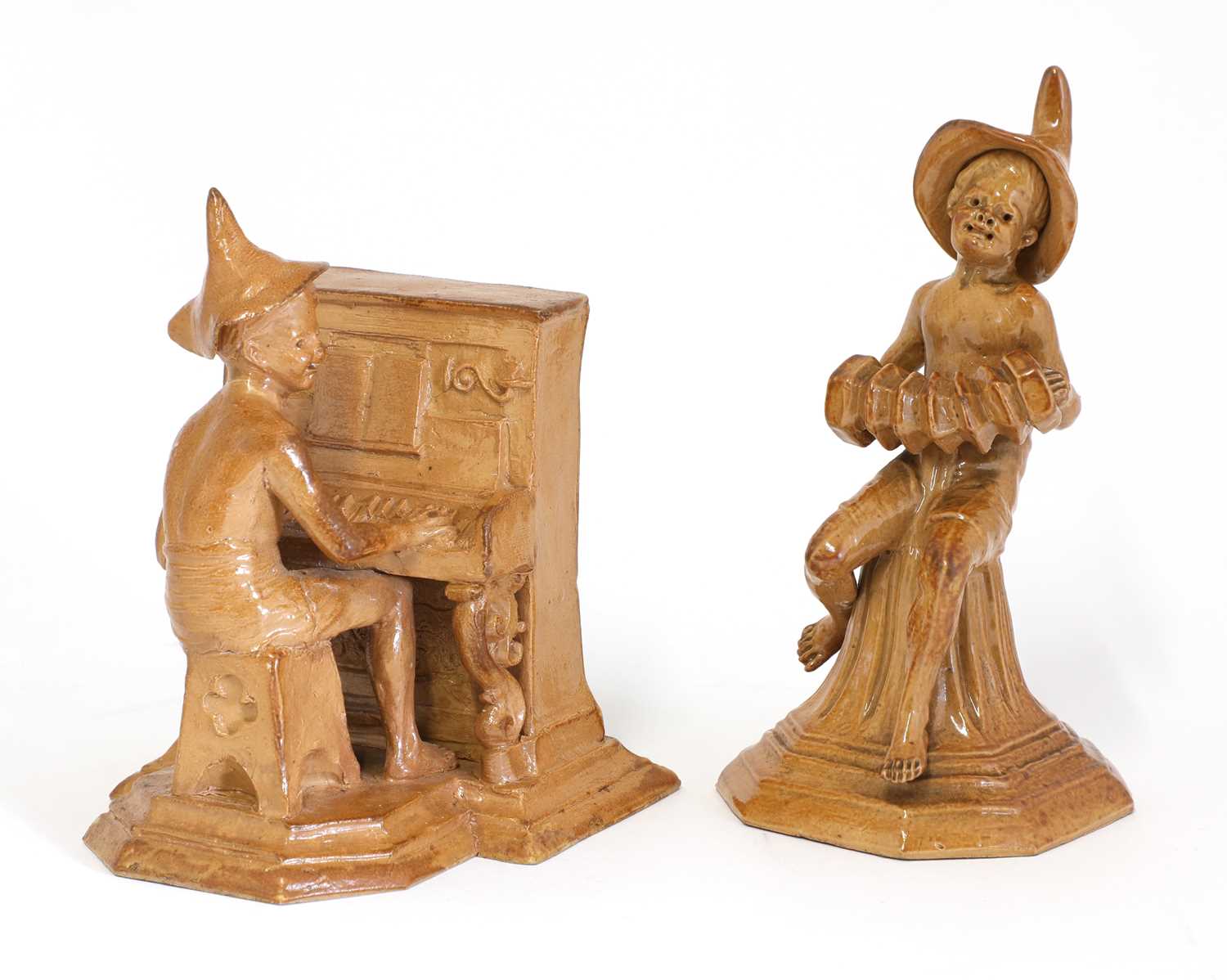 Lot 74 - Two Doulton 'Merry Musician' figure groups