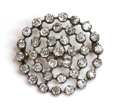Lot 45 - A late Victorian diamond set target brooch, c.1890