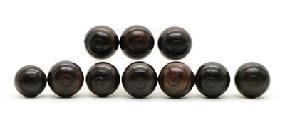 Lot 256 - A set of ten hardwood carpet bowls