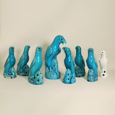 Lot 342 - A collection of seven Chinese porcelain parrots