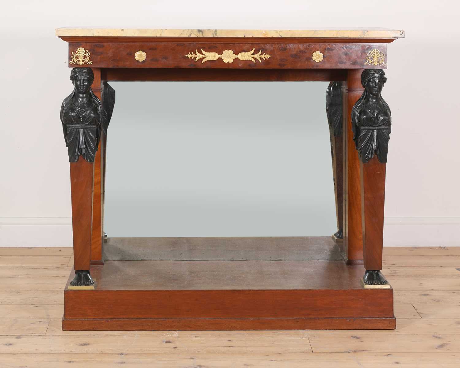 Lot 3 - A pair of First French Empire mahogany console tables