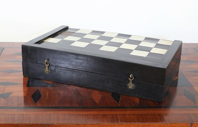 Lot 81 - An ebony folding games box