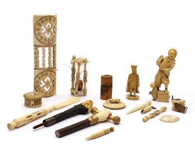 Lot 259A - A collection of ivory and bone items