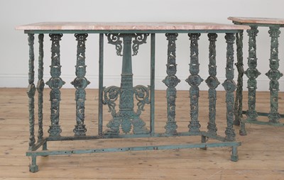 Lot 460 - A pair of marble-topped cast iron console tables