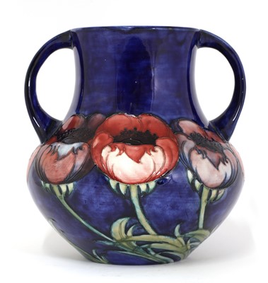 Lot 146 - A William Moorcroft ‘Poppy’ pattern pottery vase