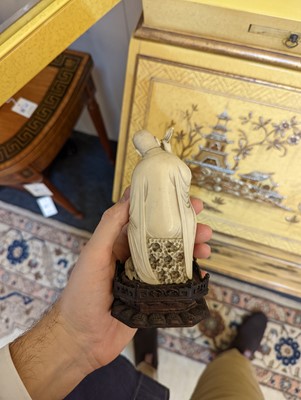 Lot 423 - A set of eighteen carved ivory figures