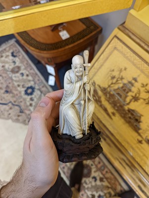 Lot 423 - A set of eighteen carved ivory figures