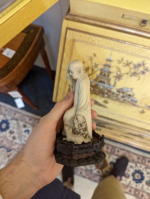 Lot 423 - A set of eighteen carved ivory figures