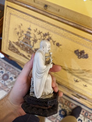 Lot 423 - A set of eighteen carved ivory figures