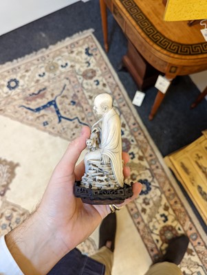 Lot 423 - A set of eighteen carved ivory figures