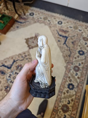Lot 423 - A set of eighteen carved ivory figures