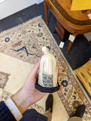 Lot 423 - A set of eighteen carved ivory figures