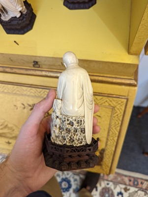 Lot 423 - A set of eighteen carved ivory figures